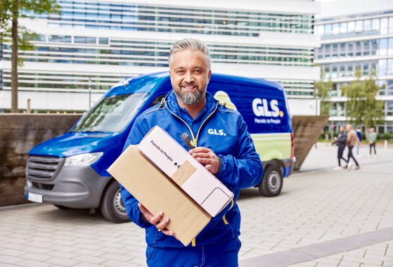 employee holding at parcel locker